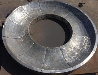 시멘트 공장의 내마모성 예비 부품용 신소재 - 세라믹 입자 강화 철계 복합 주조품